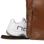 NOX Pro Series Camel backpack open showing padded racket compartment, shoe pocket and accessories storage