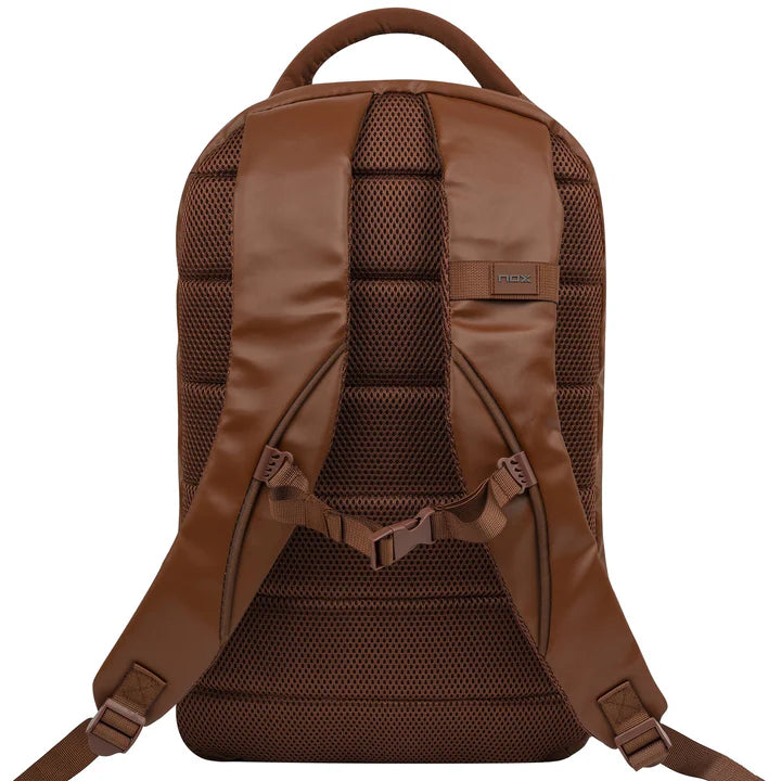 Player carrying NOX Pro Series Camel padel backpack to court — buy padel bag in South Africa at The Padel Market