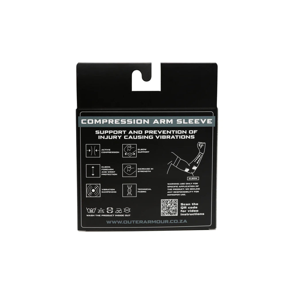 Outer Armour Compression Arm Sleeve worn during padel play — arm and elbow support