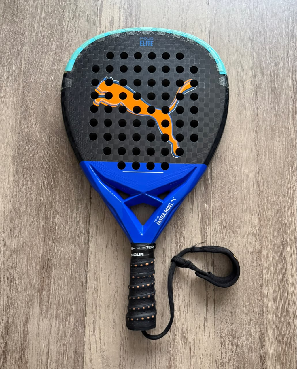 Pre-owned Puma Nova Elite CTR 2024 padel racket — good condition, round shape, black blue turquoise, South Africa