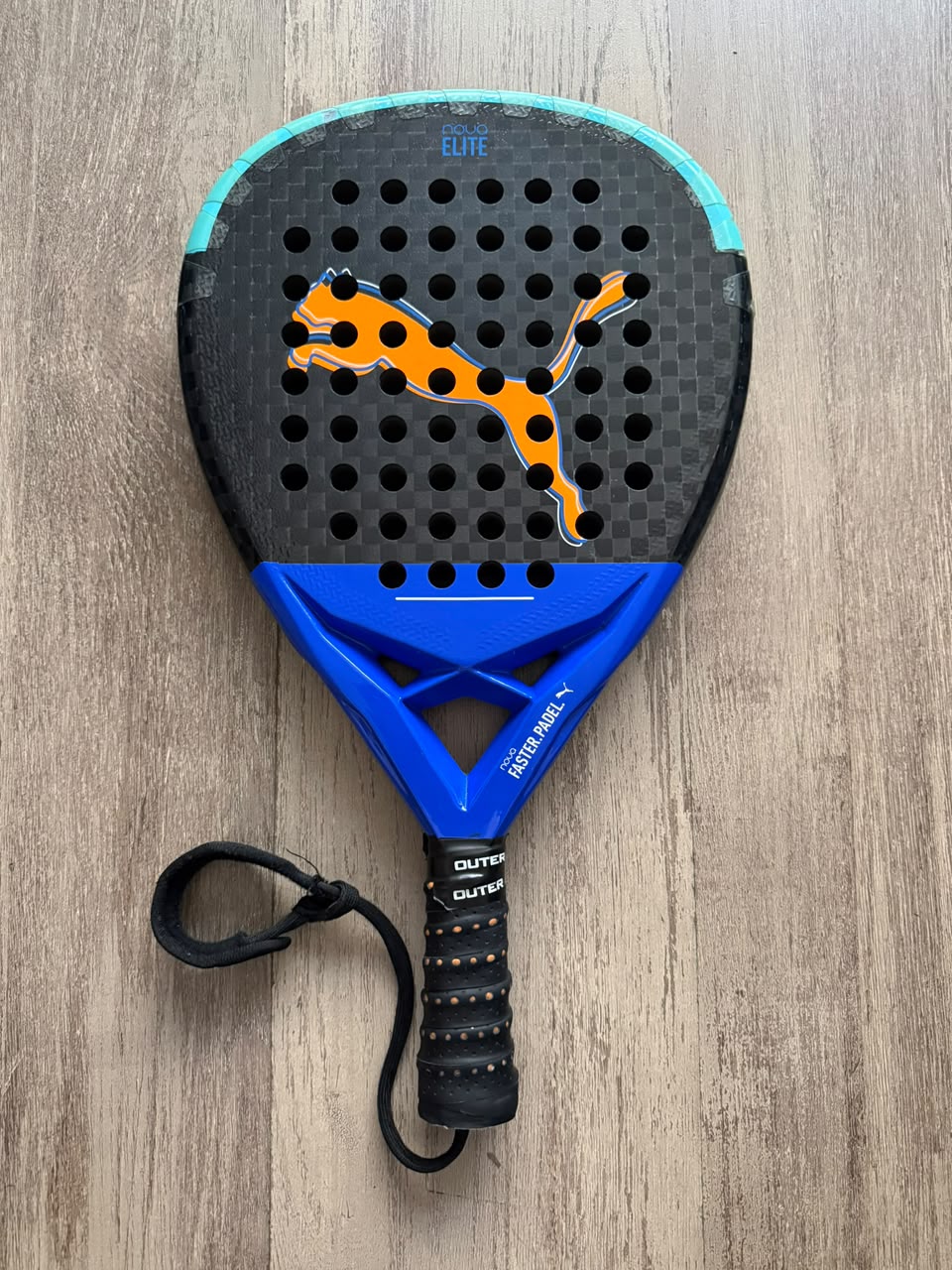 Puma Nova Elite CTR 2024 12K carbon face, TeXtreme frame and blue bridge detail — advanced control padel racket